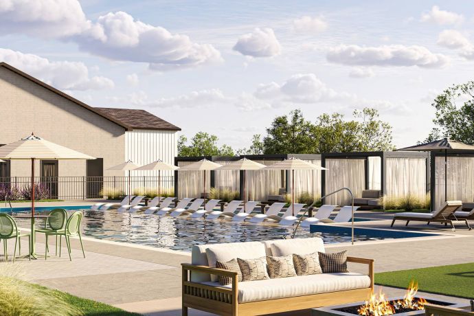 Allers Landing Modern outdoor swimming pool area with lounge chairs, cabanas, umbrellas, and a fire pit in the foreground.